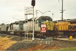 Grain train waits at the fueling pad